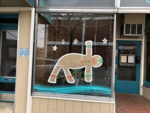 Window Decoration Gingerbread Man doing yoga. Created by one of the yoga students.